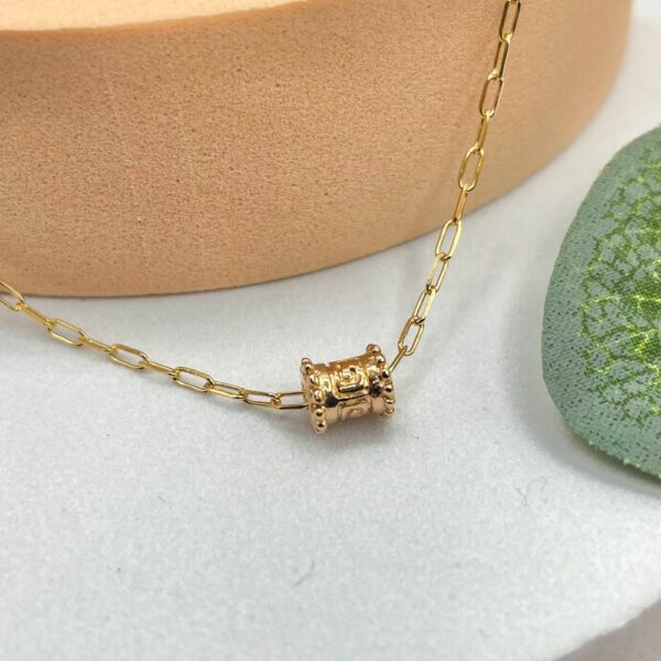 Collier bohème Fidji avec pendentif tube balinais en plaqué or