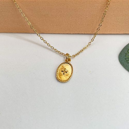Collier ras du cou en plaqué or avec médaille ovale perlée gravée d'une croix stylisée - Santorin